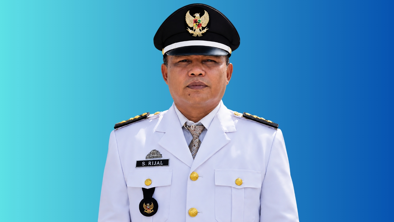SYAMSUL RIJAL, S.M.